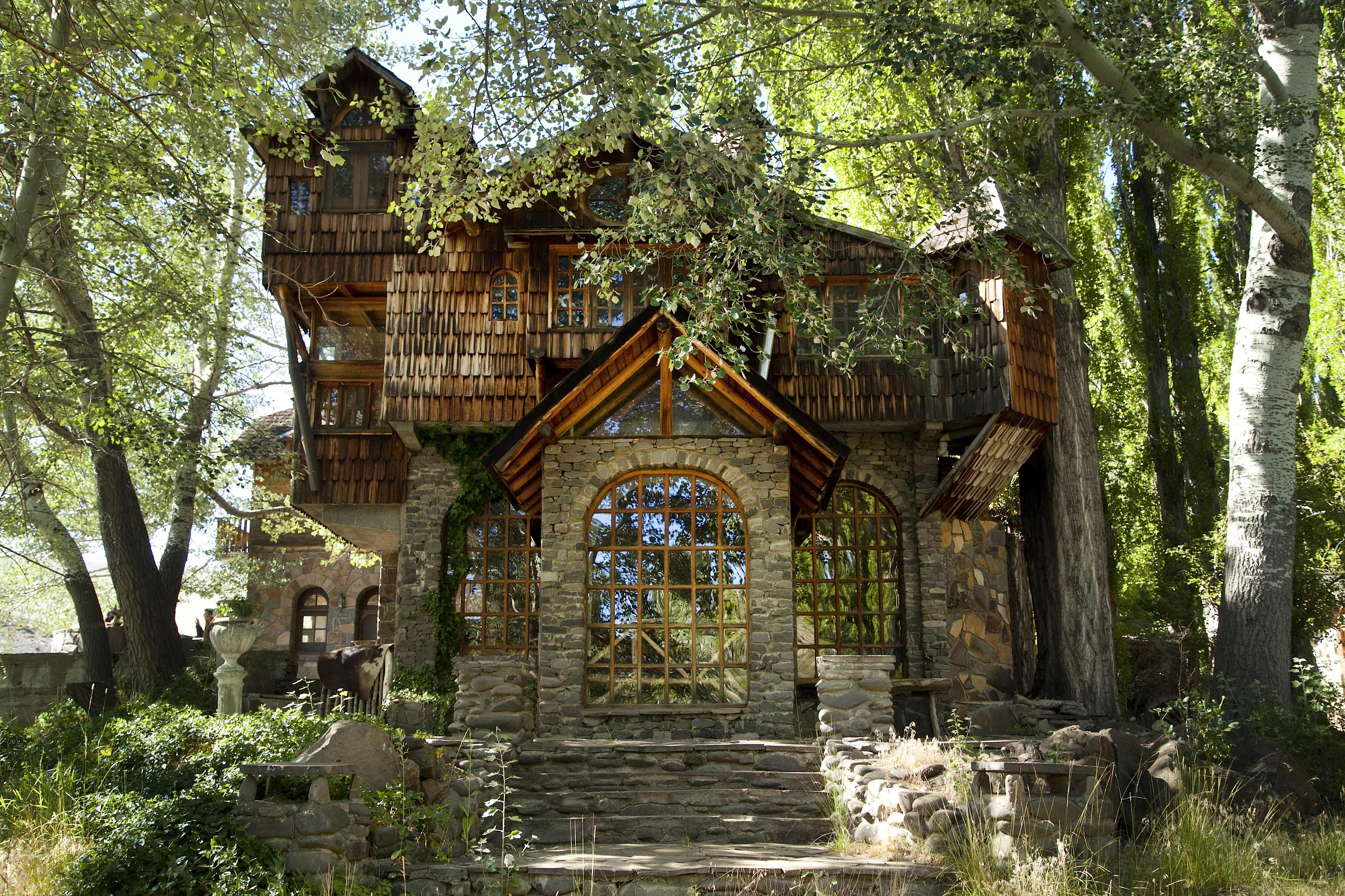 Estancia Ranquilco's wood and stone guest lodge in the trees in Patagonia Argentina