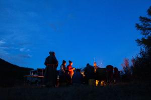 Gathered around the campfire at night in Northern Mongolia during Estancia Ranquilco's horse pack trip