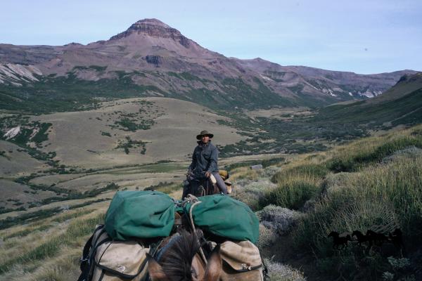 Man riding in the Andes with a pack mule on an Estancia Ranquilco pack trip