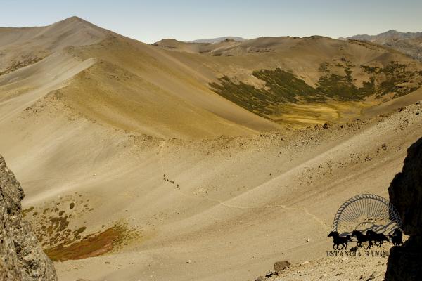 View of mountains and riders on an Estancia Ranquilco pack trip into the Andes